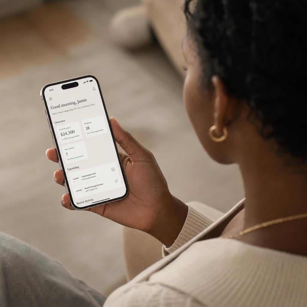 Entrepreneur opening the VSNRY Studio app on her phone at home